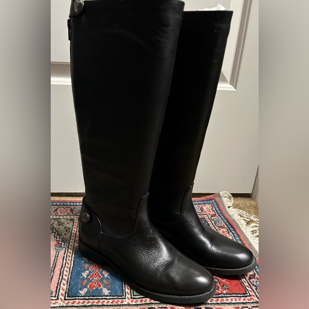 Women’s tall boots in black leather